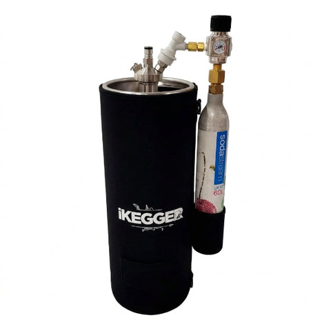 A black neoprene-wrapped stainless steel tank with a metal regulator and a separate silver cylinder bottle standing beside it on a plain white background.