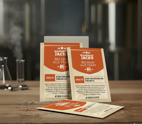 Three packets of 'Mangrove Jack's Belgian Ale Yeast' on a wooden surface with a blurred background.