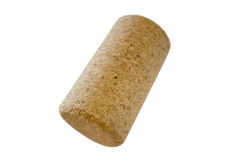 A single cork isolated on a white background.